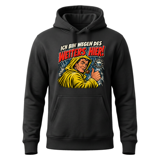 Schwarzer Hoodie mit Retro-Comic-Seemann im gelben Ölzeug und Schriftzug „Ich bin wegen des Wetters hier!“ – Bad Weather Club von Mistwetter